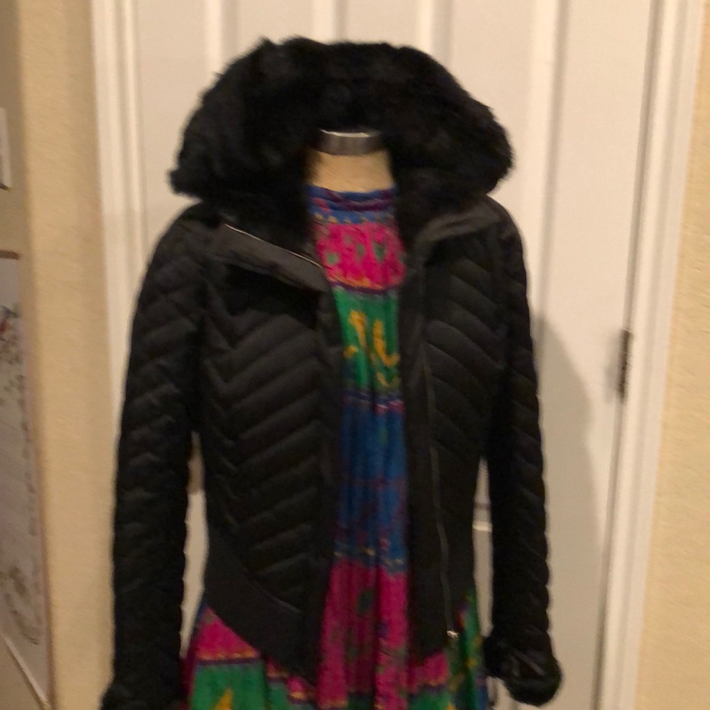 Bebe black feather jacket with fur.